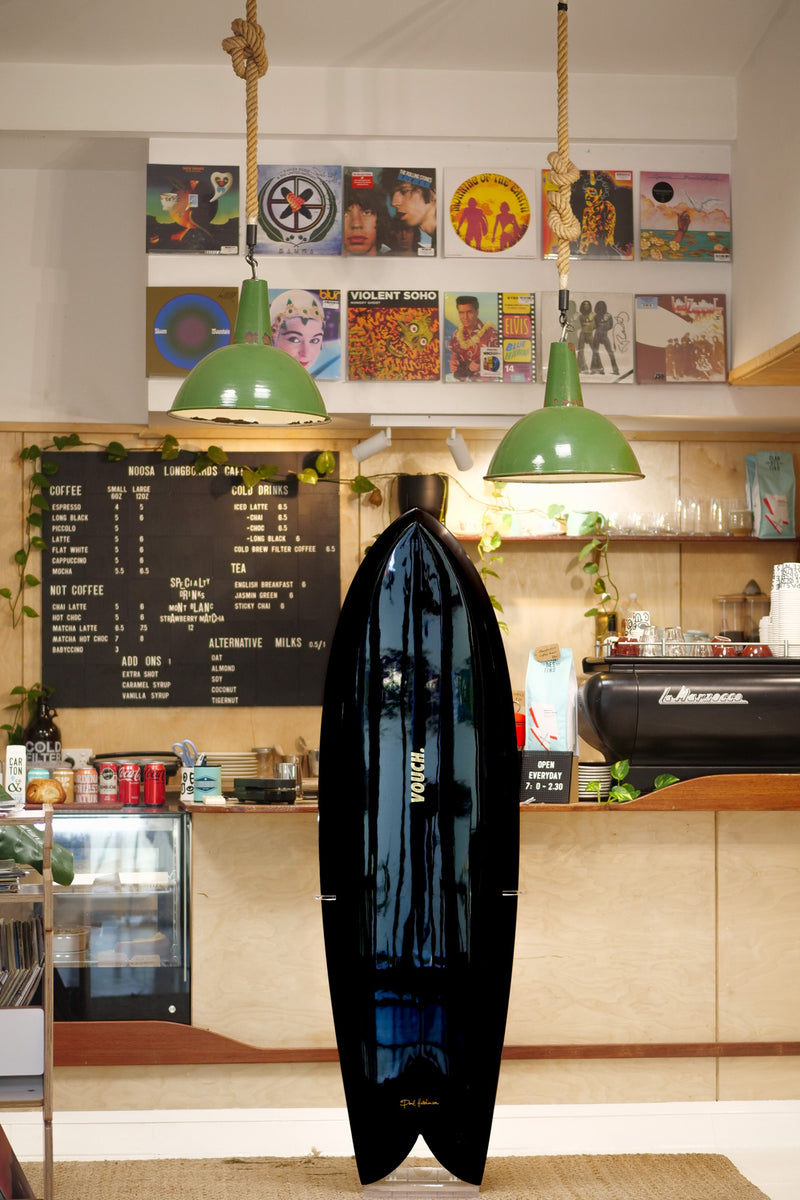 5'10" Vouch VISH black pigment deck and bottom, polished deck, glass on black keels