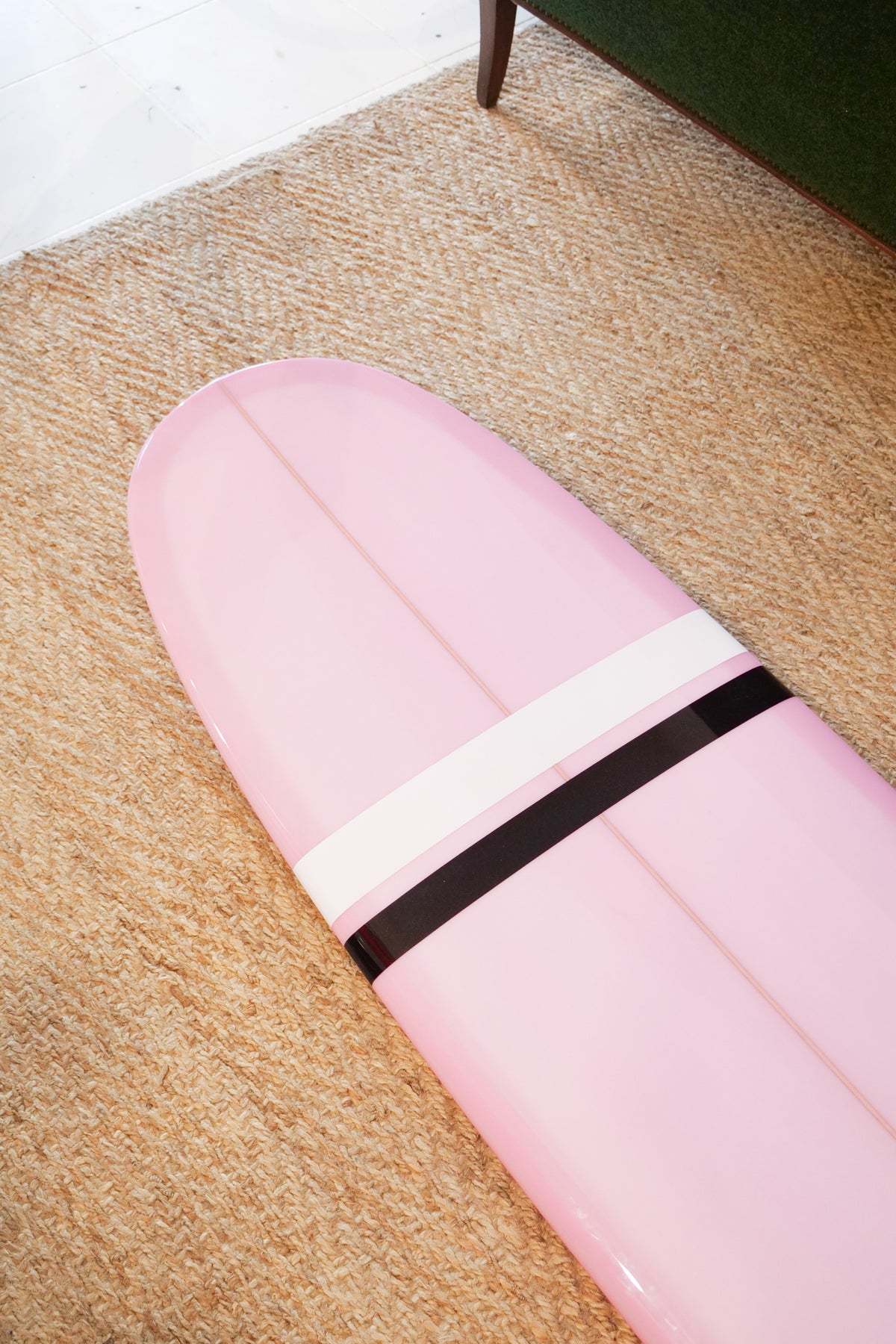 9'3" Noosa Longboards Tea Tree Model pale pink semi pigment deck and bottom, black and white TT bands, gloss and polish