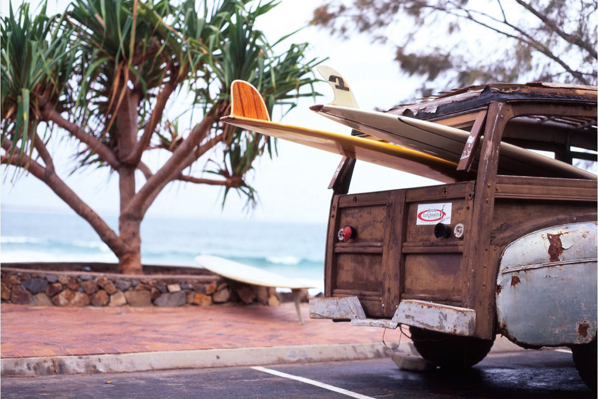 Surfboards in the Noosa Longboards Woody beside the beach