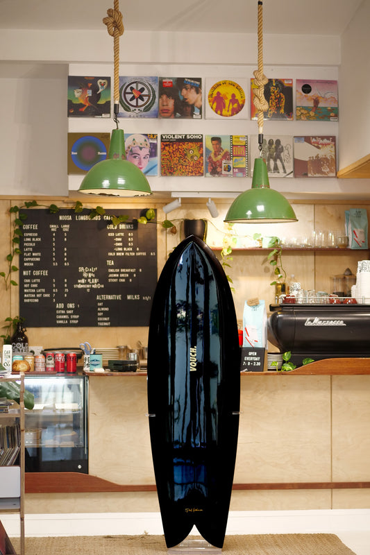 5'10" Vouch VISH black pigment deck and bottom, polished deck, glass on black keels