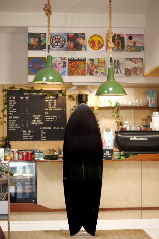 5'10" Vouch VISH black pigment deck and bottom, polished deck, glass on black keels