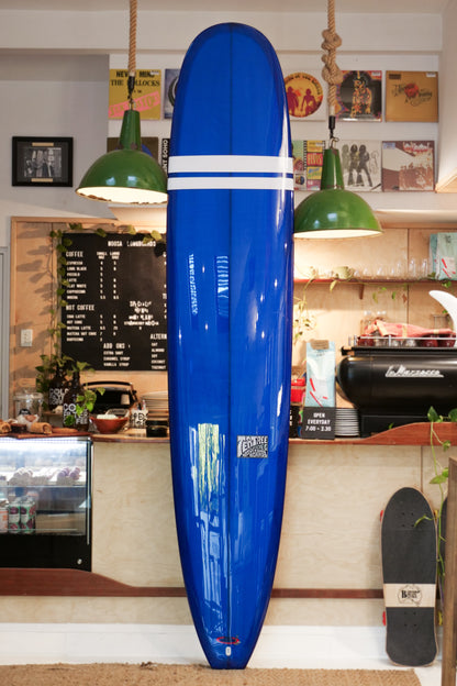 9'6" Noosa Longboards Tea Tree Model navy blue tint deck and bottom, white TT bands, gloss and polish