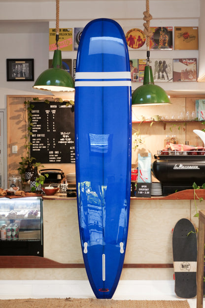 9'6" Noosa Longboards Tea Tree Model navy blue tint deck and bottom, white TT bands, gloss and polish