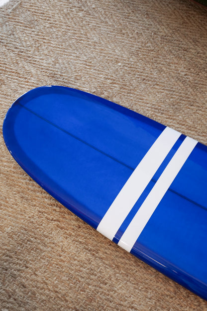 9'6" Noosa Longboards Tea Tree Model navy blue tint deck and bottom, white TT bands, gloss and polish