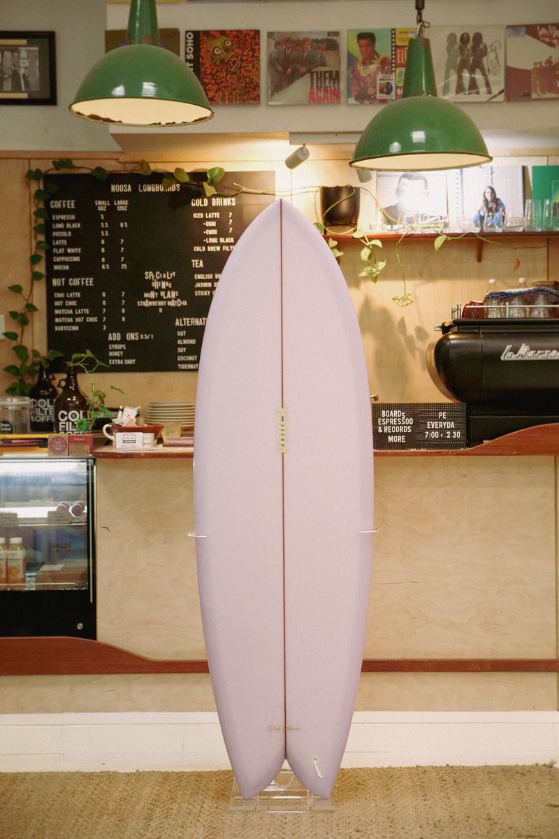 5'8" Vouch VISH lavender tint deck and bottom, glass on wood keels