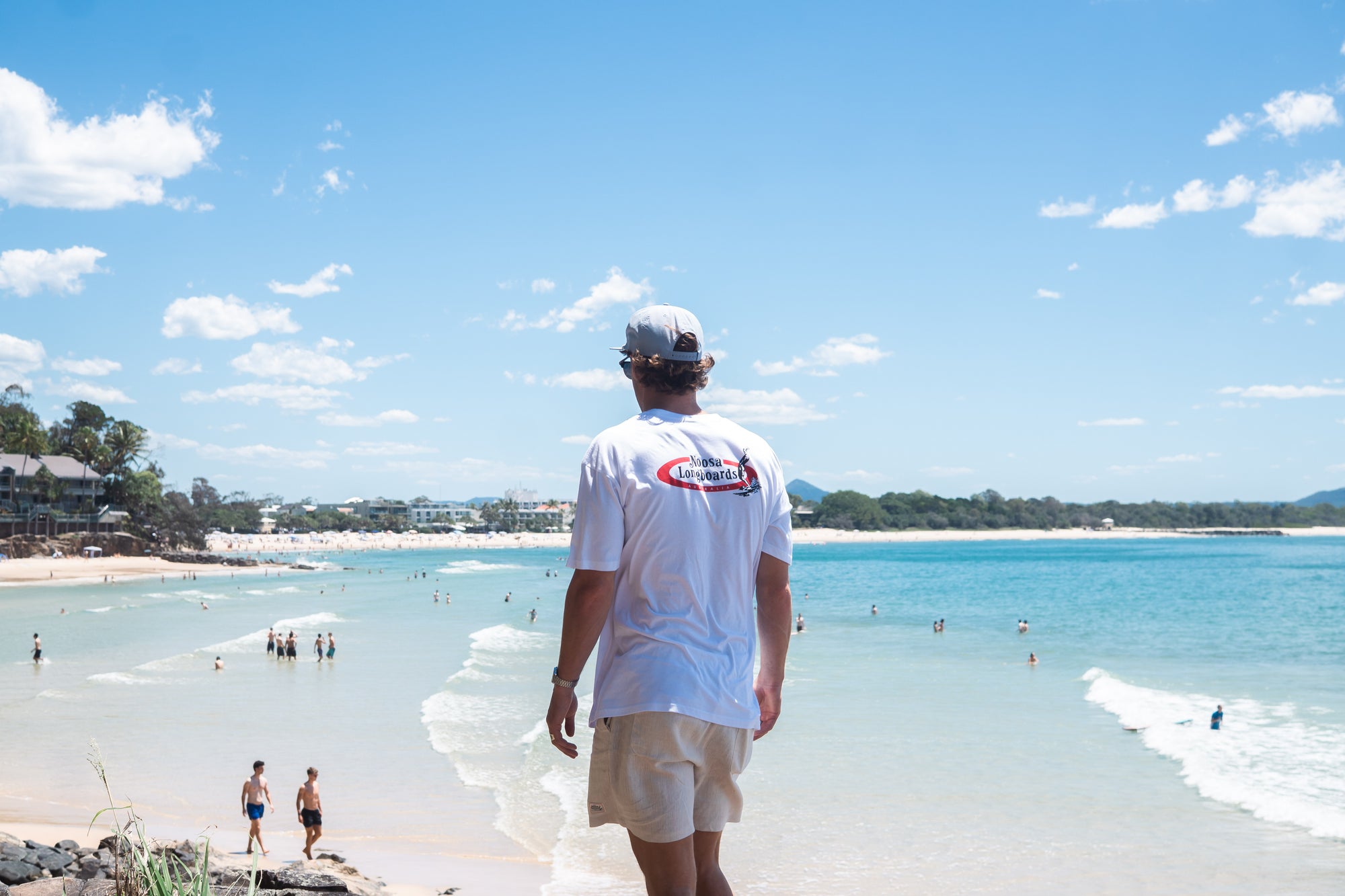 Noosa Longboards Original Tee overlooking Noosa Main Beach