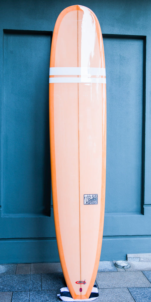 9'6" N.L. Tea Tree salmon tint, white bands, gloss and polish